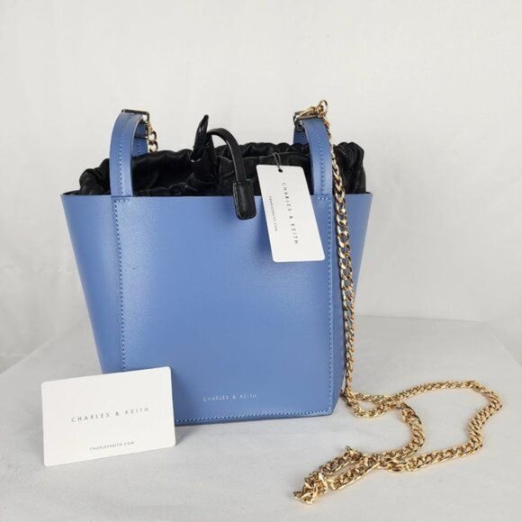 Charles & Keith Handbags - Charles & Keith Blue Crossbody Bucket Bag Purse Chainlink Gold Strap Lined
